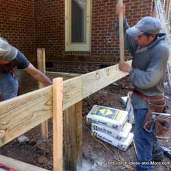 installation de planches de rive sur une terrasse