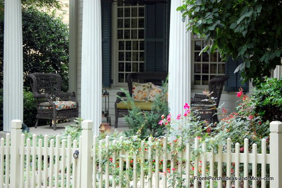 wicker chairs on front porch