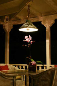 Chandelier over table on porch